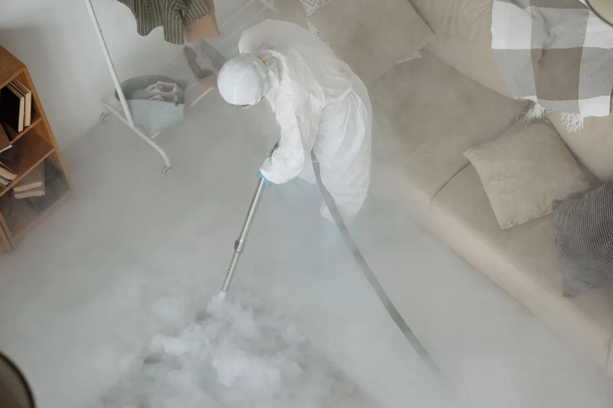 Biohazard cleanup technician in protective equipment, Cliffwood Beach, NJ